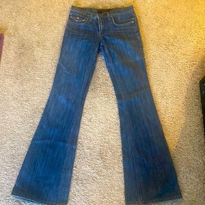 Juicy Couture, denim, flare, button back pockets, with zipper front.